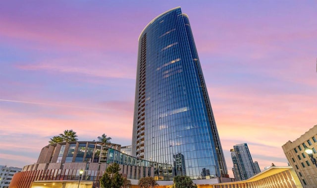 view of outdoor building at dusk