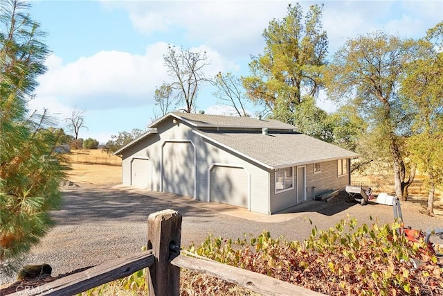 view of home's exterior with a garage