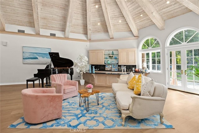 living room featuring beamed ceiling, french doors, high vaulted ceiling, and light hardwood / wood-style flooring