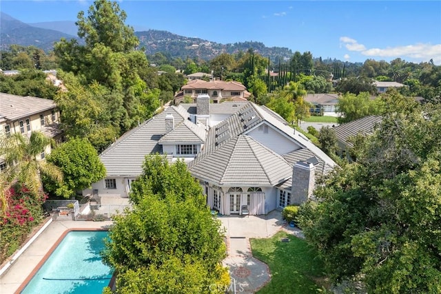 drone / aerial view featuring a mountain view