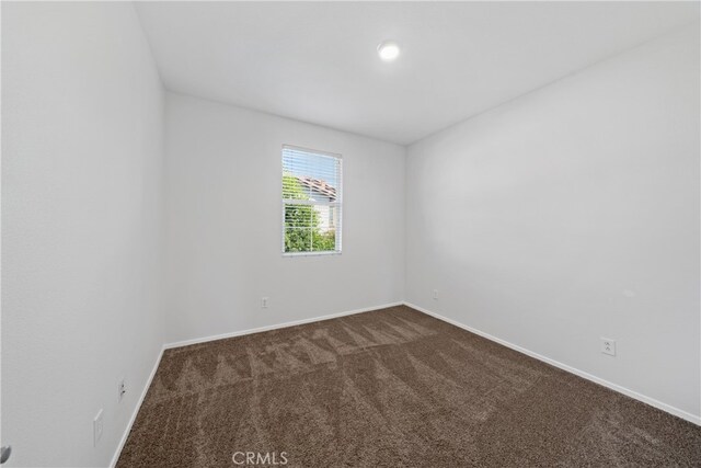 unfurnished room featuring carpet floors