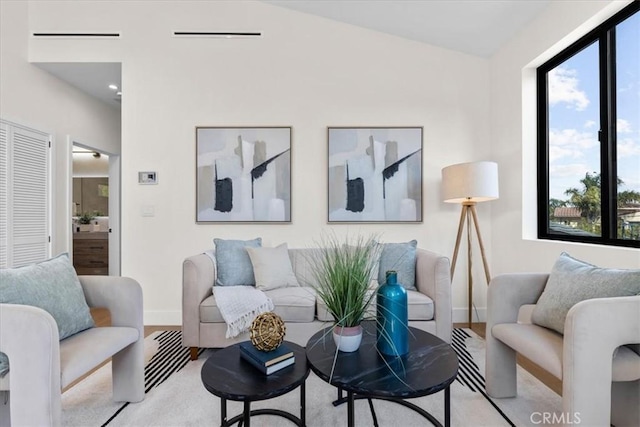 living room with light hardwood / wood-style floors