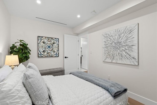 bedroom featuring hardwood / wood-style flooring