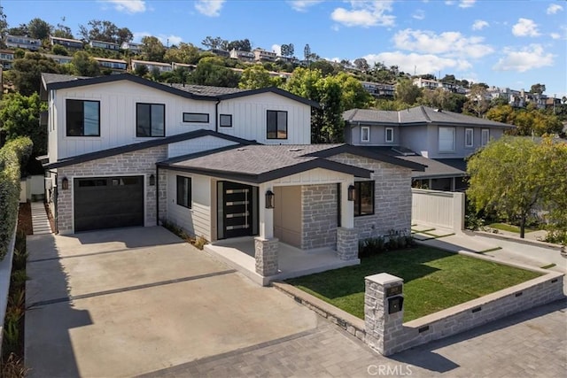 view of front of property with a garage