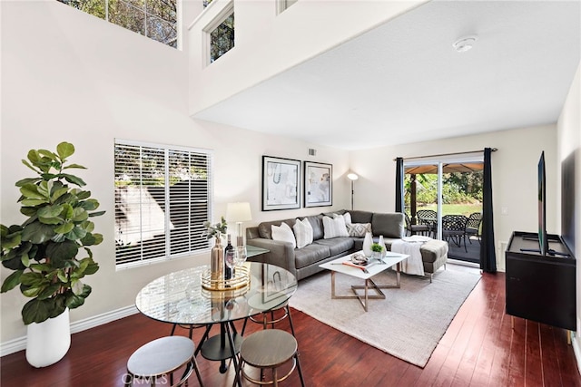 living room with dark wood-type flooring