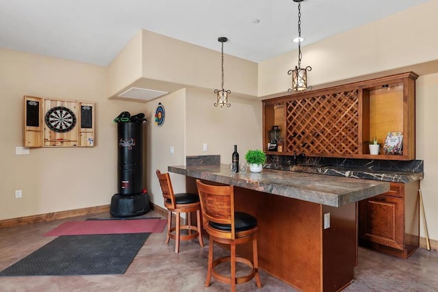 bar featuring decorative light fixtures