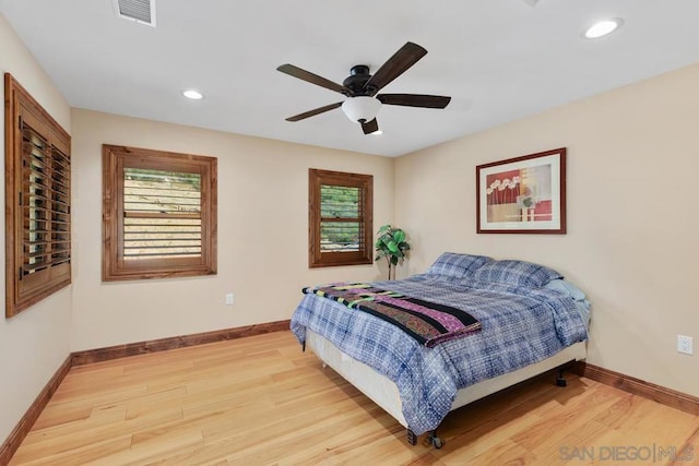 bedroom featuring ceiling fan and light wood-type flooring