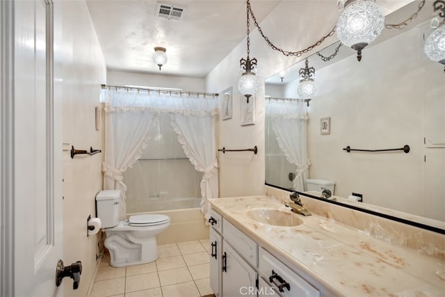 full bathroom featuring tile patterned flooring, vanity, toilet, and shower / bath combination with curtain