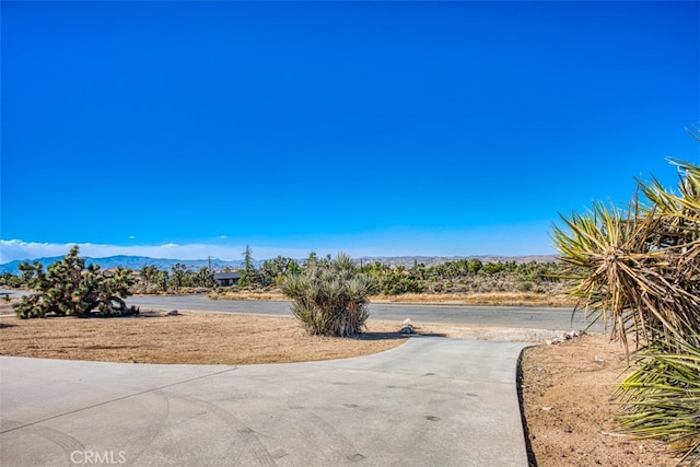 exterior space featuring a mountain view