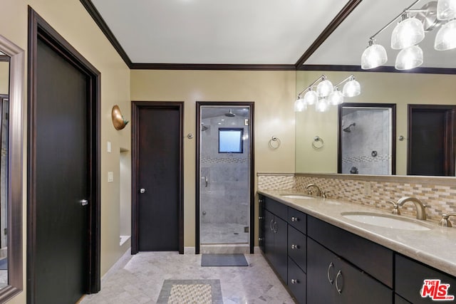 bathroom featuring an inviting chandelier, a tile shower, tasteful backsplash, crown molding, and vanity