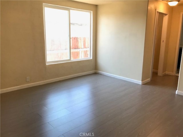 spare room featuring hardwood / wood-style flooring