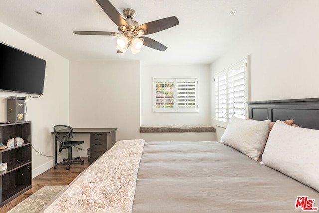 bedroom featuring hardwood / wood-style flooring and ceiling fan