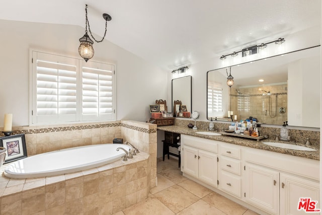 bathroom featuring tile patterned floors, vanity, plus walk in shower, and vaulted ceiling