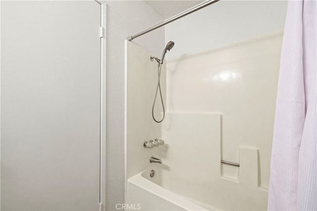 bathroom featuring shower / bath combo