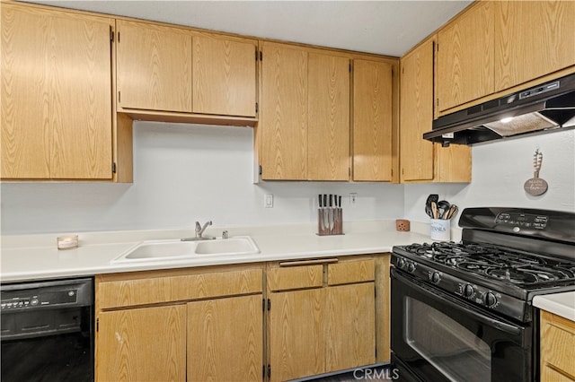 kitchen with black appliances, sink, and extractor fan