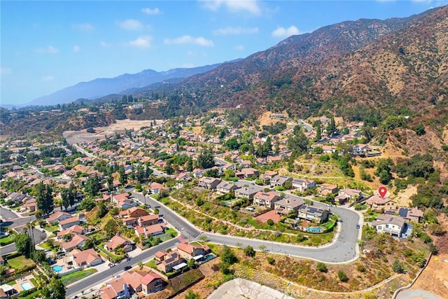 bird's eye view with a mountain view and a residential view