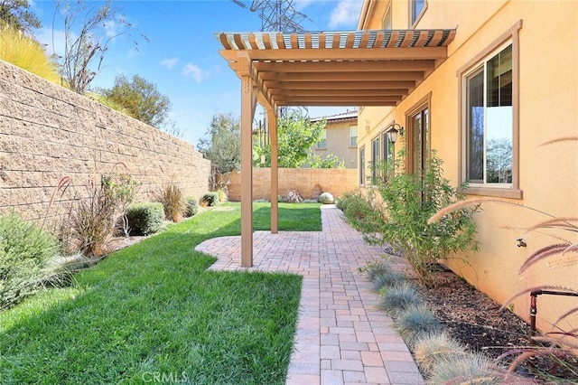 view of yard with a patio area, fence private yard, and a pergola