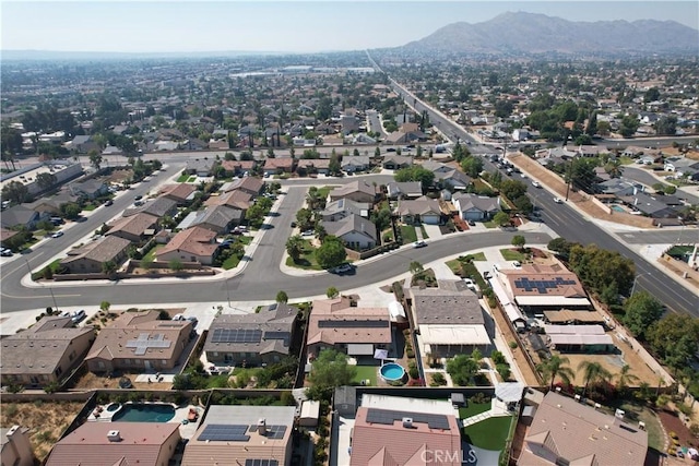 drone / aerial view featuring a mountain view