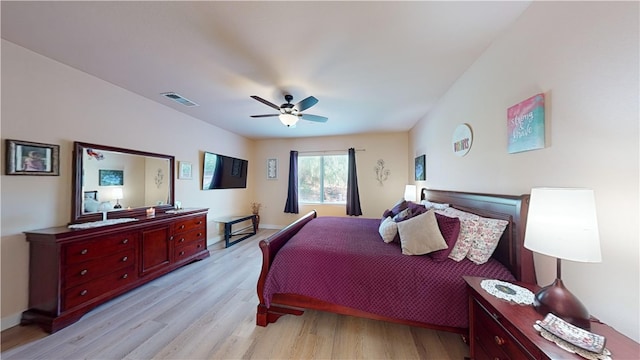 bedroom with ceiling fan and light wood-type flooring