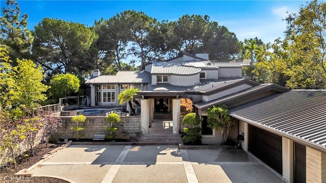 view of front of property with a garage