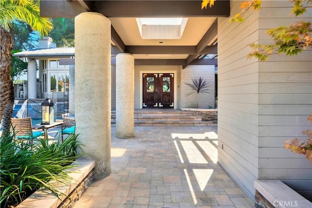 view of exterior entry with french doors