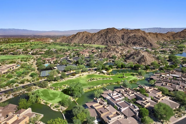 bird's eye view with a water and mountain view