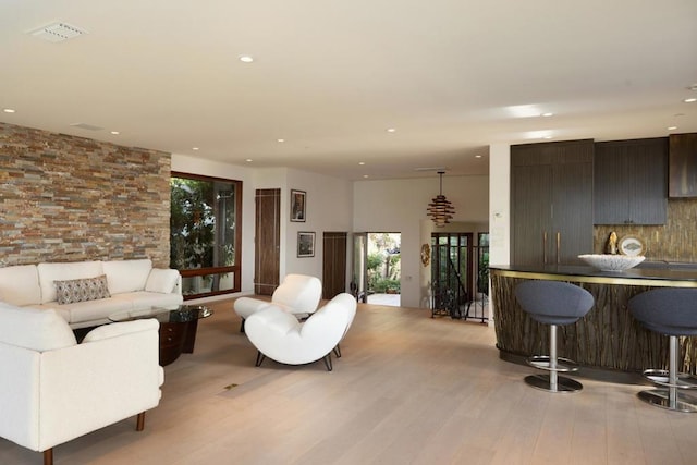 living room featuring light wood-type flooring