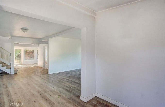 572 Church Hill Rd, La Habra Heights, CA 90631 - empty room with stairway and light wood finished floors