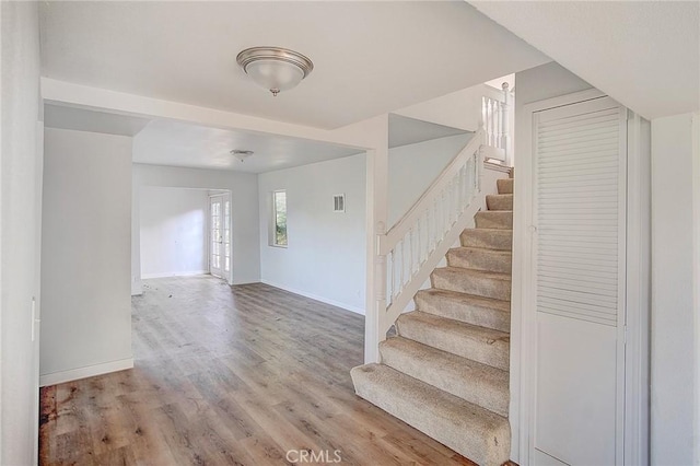 572 Church Hill Rd, La Habra Heights, CA 90631 - stairs with baseboards and wood finished floors