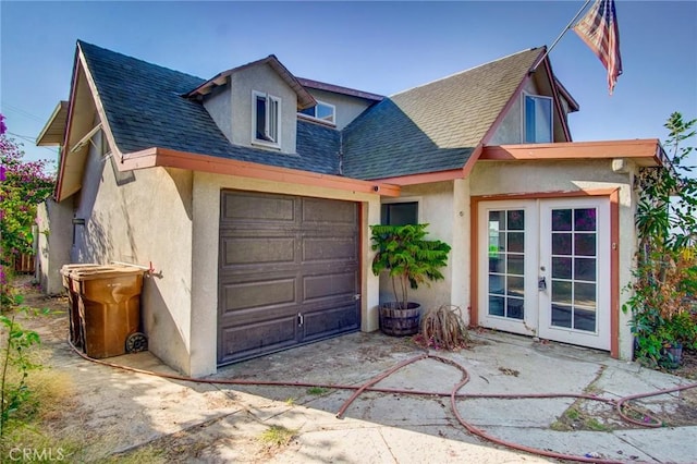 572 Church Hill Rd, La Habra Heights, CA 90631 - view of front of property featuring stucco siding, roof with shingles, a garage, and french doors