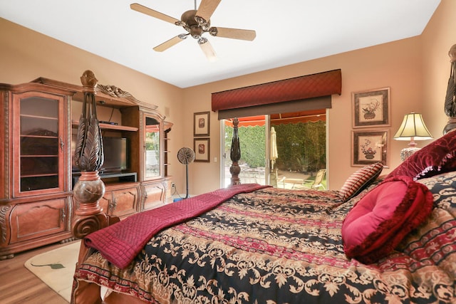 bedroom with ceiling fan, hardwood / wood-style floors, and access to exterior