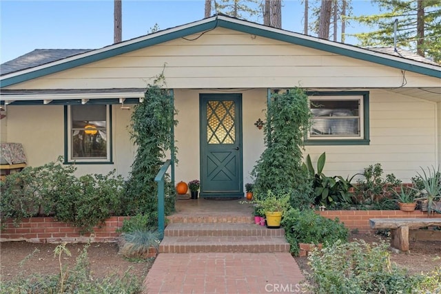 entrance to property with a porch