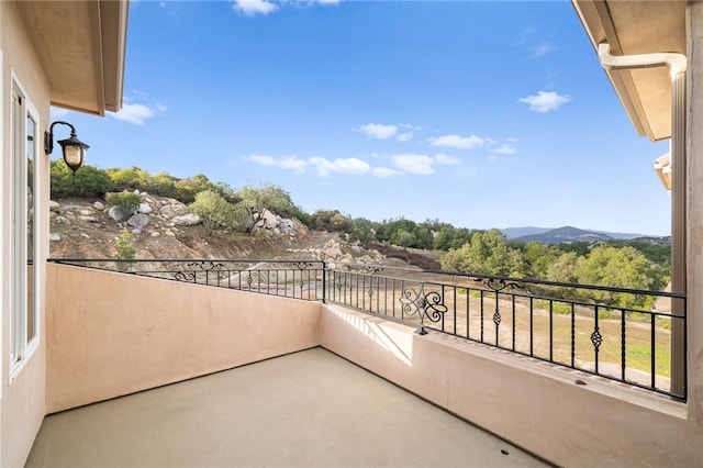 balcony featuring a mountain view