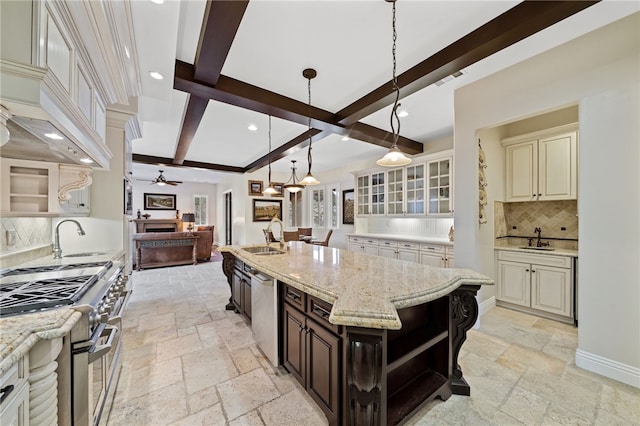 kitchen featuring hanging light fixtures, backsplash, stainless steel appliances, beam ceiling, and dark brown cabinetry