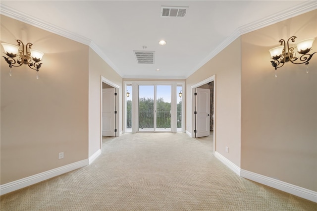 hallway with ornamental molding, light carpet, and a chandelier