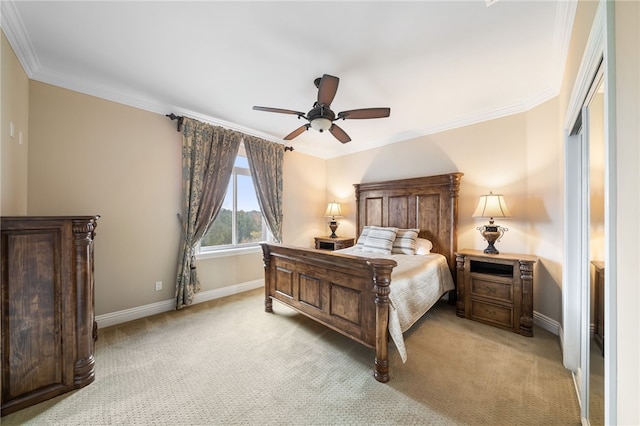 bedroom with ceiling fan, light colored carpet, and ornamental molding