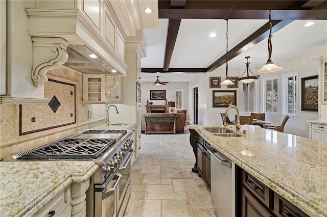 18378 Avenida Bosque, Murrieta, CA 92562 - kitchen featuring stone tile flooring, appliances with stainless steel finishes, premium range hood, recessed lighting, and cream cabinets