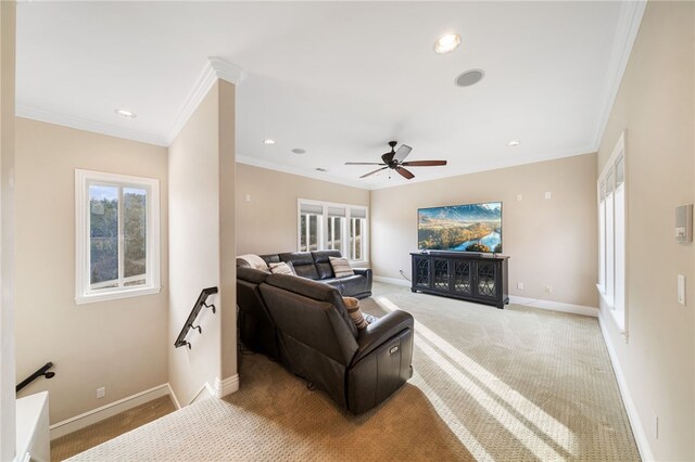 living room with light carpet, ceiling fan, and ornamental molding