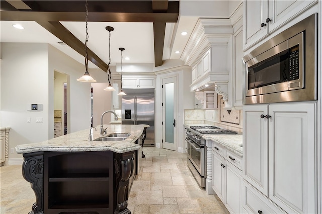 kitchen featuring light stone countertops, built in appliances, pendant lighting, beam ceiling, and sink