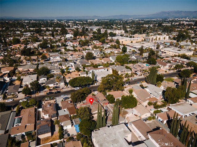 drone / aerial view featuring a mountain view