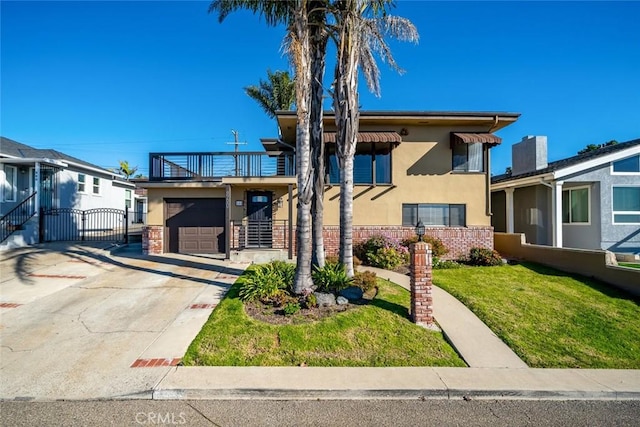 view of front of house with a balcony, a garage, and a front lawn