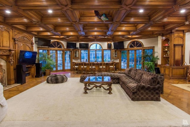 living room featuring french doors, wooden ceiling, coffered ceiling, and light parquet flooring