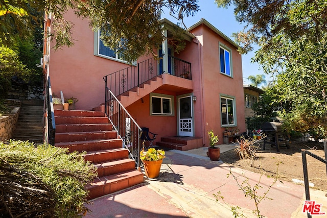 view of front of property with a patio