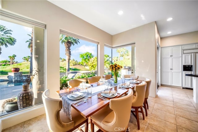 dining area with light tile patterned floors