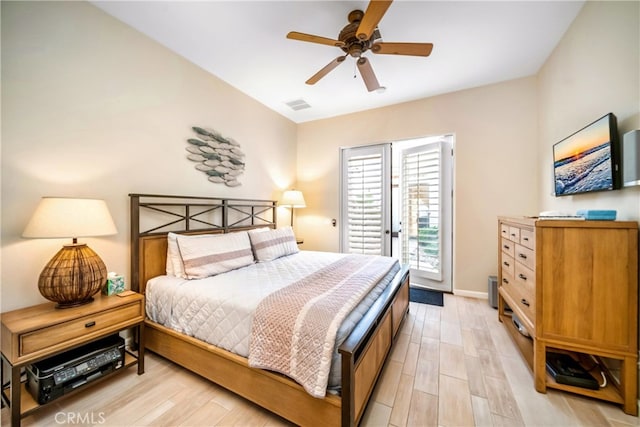 bedroom with access to exterior, ceiling fan, and light hardwood / wood-style floors