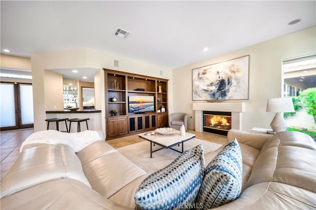 living room featuring light tile patterned floors