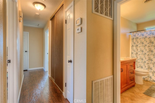 hall featuring hardwood / wood-style floors