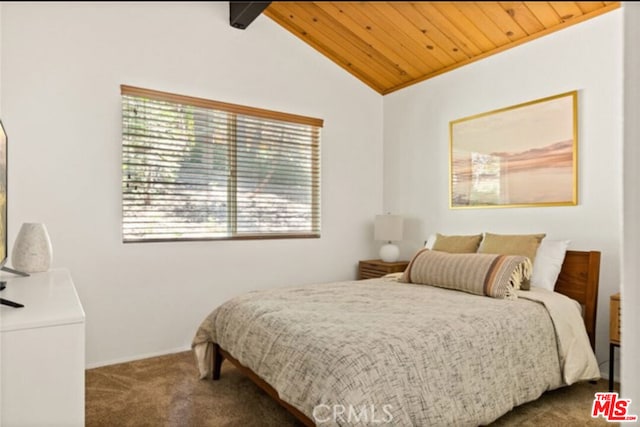 bedroom featuring wooden ceiling, carpet, and vaulted ceiling