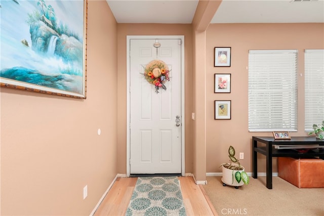 foyer entrance featuring light wood-type flooring