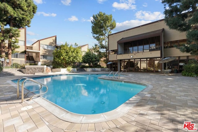 view of pool with a patio